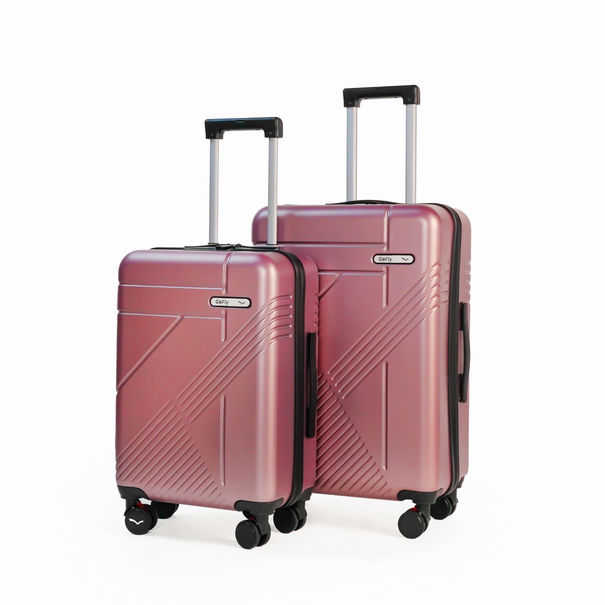 Two pink suitcases with black wheels on a white background
