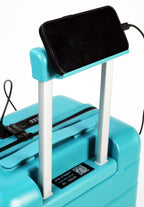 Turquoise suitcase with a phone on top and charging cable, on a white background