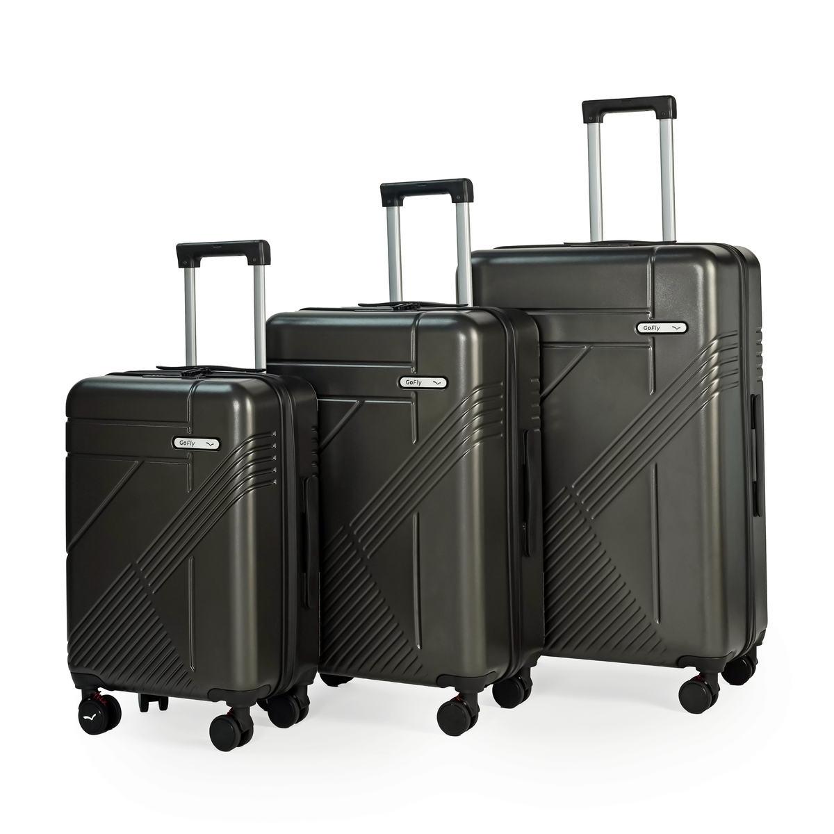 Set of three black suitcases of different sizes on a white background