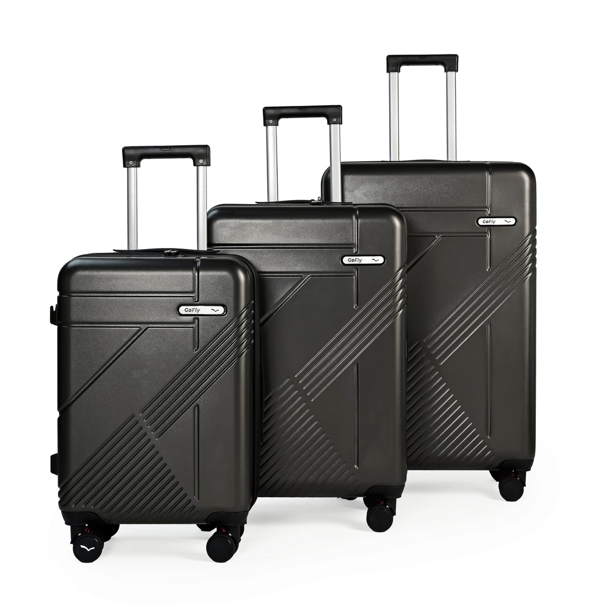 Set of three black suitcases with geometric patterns on a white background