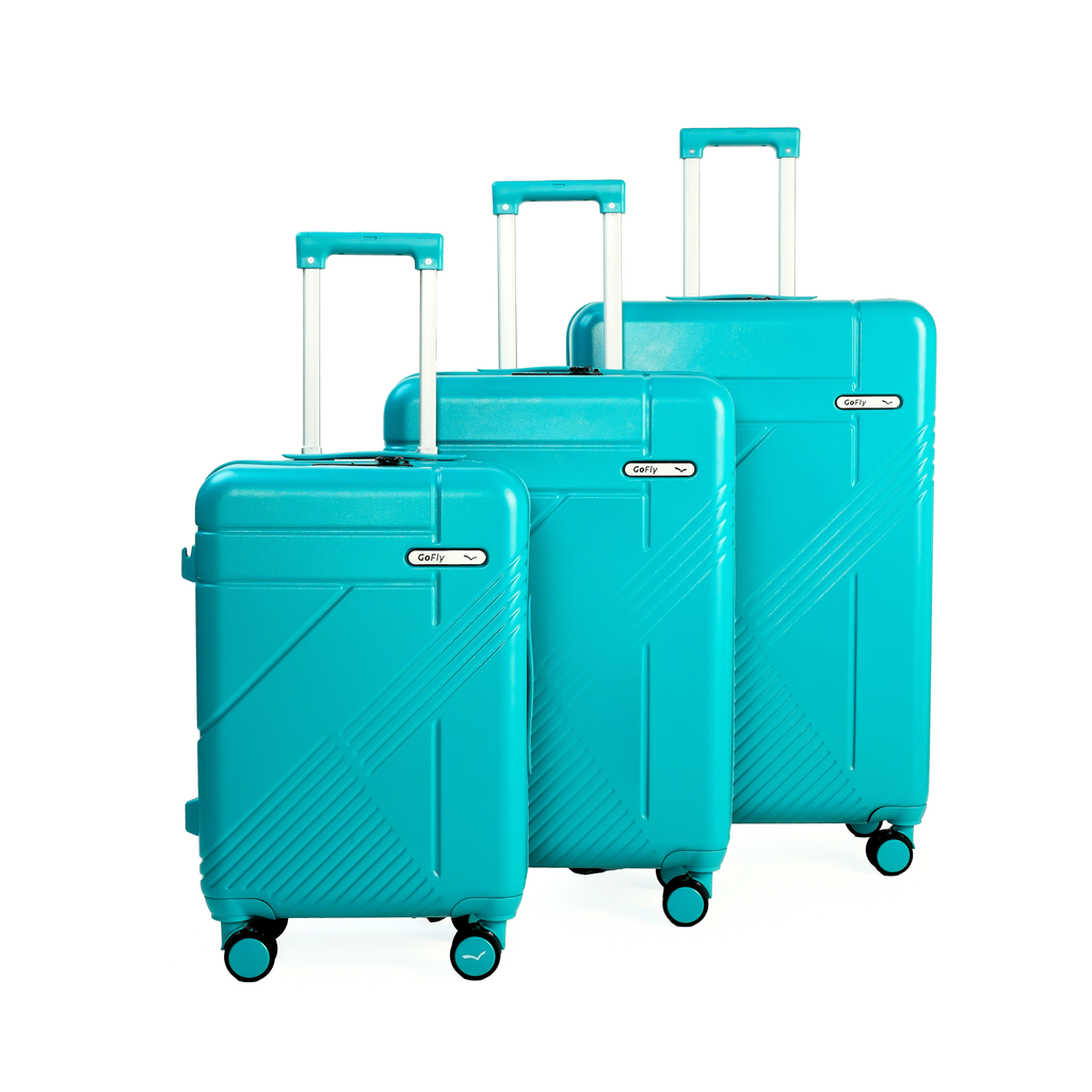 Set of three turquoise suitcases with matching handles on a white background