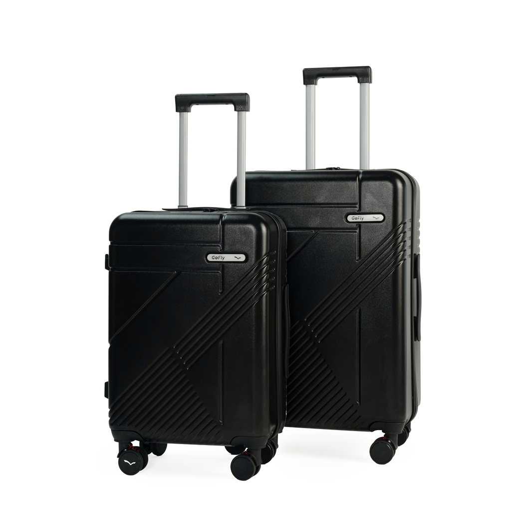 Two black suitcases with wheels on a white background
